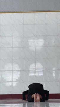 Muslim Man Praying in Mosque