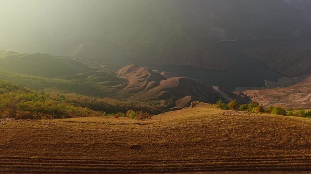 Aerial view of reservoir in arid mountain valley
