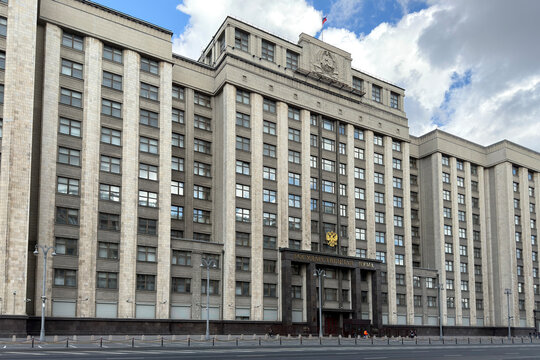 Moscow, Russia - August 9, 2026: wide view of State Duma government building and Okhotny Ryad roadway in central Moscow
