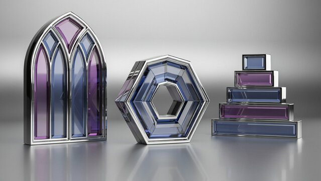 Three geometric sculptures featuring metallic frames and iridescent glass, including a gothic arch, a hexagon, and a stacked rectangular pyramid shape