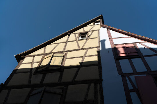 A close-up of the roofs and the typical half-timbered architecture of the houses in Colamr, Alsace "maison &agrave; colombages" or "Fachwerkhaus"
