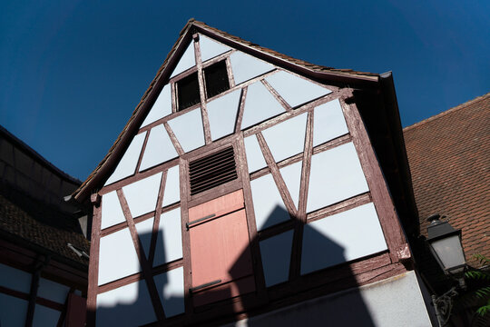 A close-up of the roofs and the typical half-timbered architecture of the houses in Colamr, Alsace "maison &agrave; colombages" or "Fachwerkhaus"