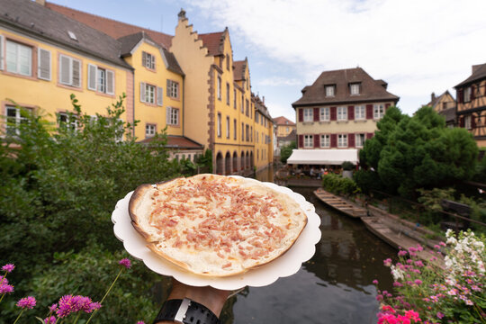 Tarte flamb&eacute;e to eat in or take out, on the bridge in &ldquo;Little Venice&rdquo; in Colmar, Alsace, France