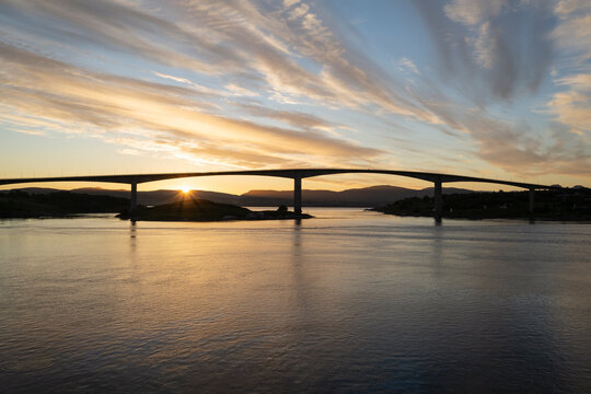 Summer midnight sun behind Saltstraumen bridge, Nordland, Norway