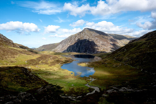 Dramatic mountain valley with a lake in Snowdonia National Park Wales