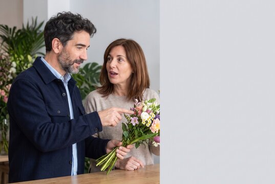 Couple choosing flowers for a Valentine celebration