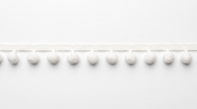 White wall molding with a row of round decorations in an interior space
