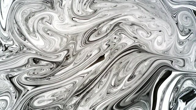 Soft gray marble pattern of diluted ink slowly drifting on water, Japanese suminagashi marbling seen from above. Backlit monochrome background, real time 4K.