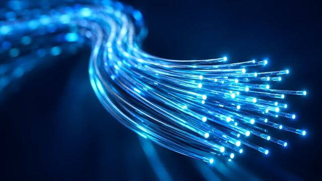 Bundle of glowing blue fiber optic cables transmitting light illustrating high speed broadband internet, digital communication, and advanced network