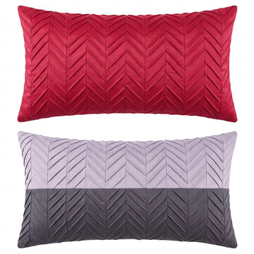 Decorative pillows with textured pleated chevron pattern