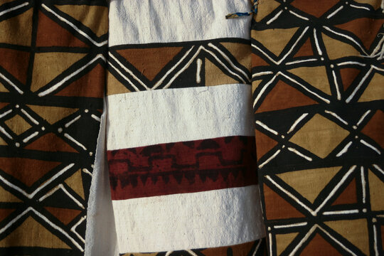 Close up of traditional mud cloth textiles with geometric black and white patterns, Mopti Region, Djenne, Mali