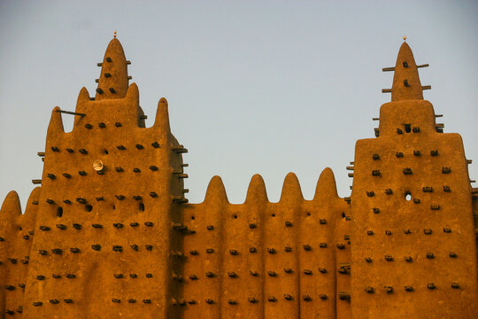 Close view of two towers of the Great Mosque with protruding wooden beams, Mopti Region, Djenne, Mali