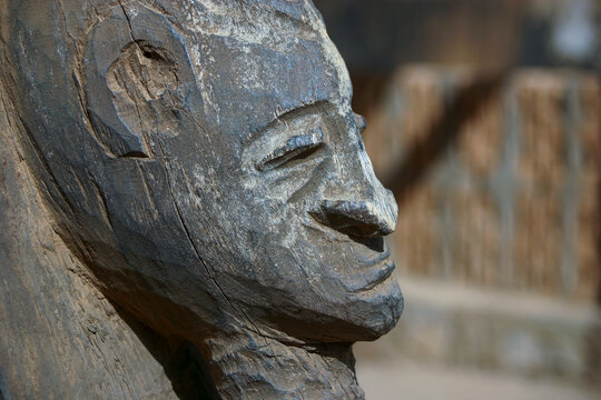 Close up of the carved wooden face of a Dogon statue, Mopti Region, Bandiagara, Mali