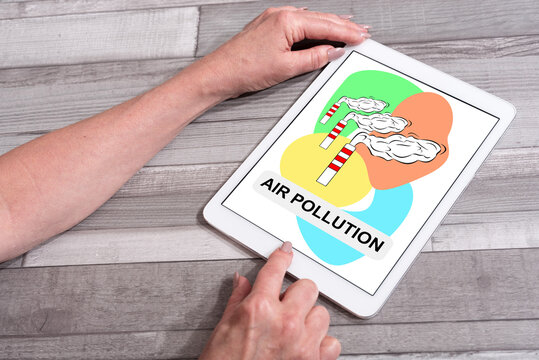 Air pollution concept on a tablet