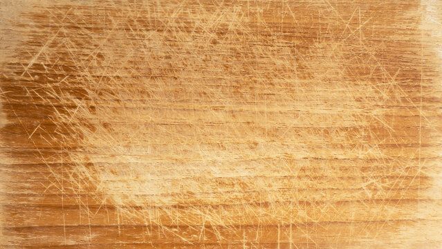 Old brown rustic dark grunge scratched wooden cutting board timber texture - wood background banner
