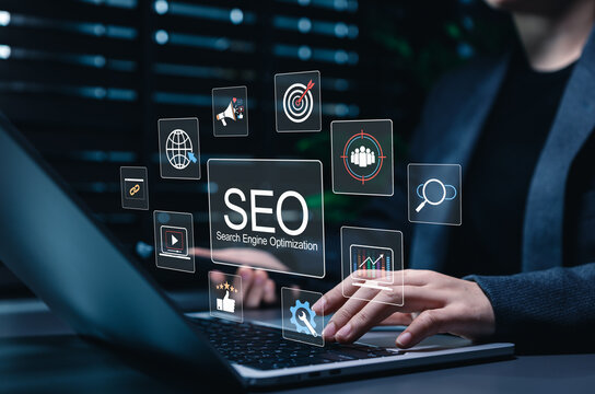 SEO search engine optimization concept. Businesswoman using laptop with target audience, analytics, content, ranking, links and marketing icons to illustrate website visibility, traffic growth