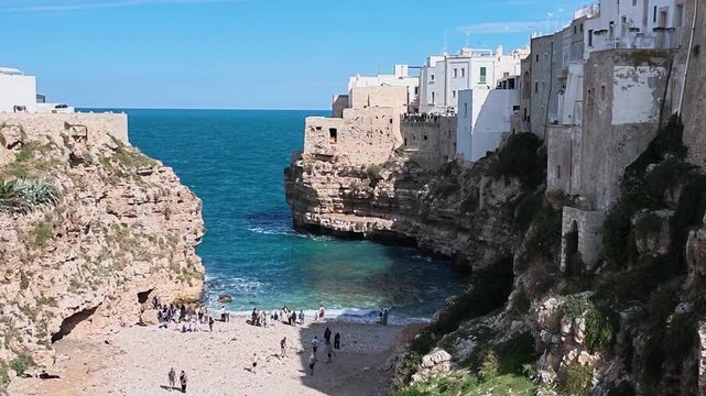 Elevated view of Lama Monachile beach and turquoise sea, Polignano a Mare, Italy