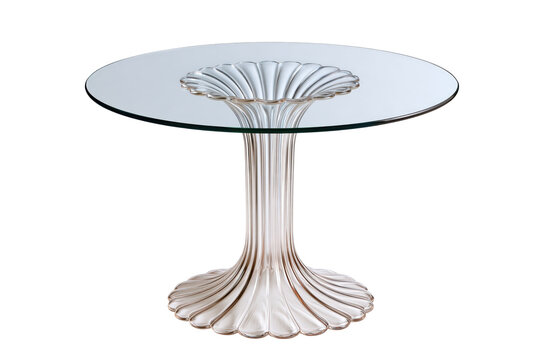 Round glass dining table isolated on white background with clipping path, featuring fluted sculptural pedestal and reflective tabletop