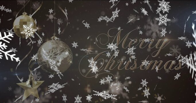 Displaying studio holiday graphic showing metallic Merry Christmas script with gold, glass baubles