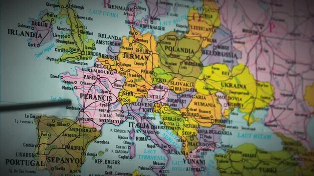 Footage detail: an instructor explaining a map showing the location of France and its capital, Paris.