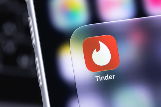 smartphone with Tinder logo on the screen. Tinder is a social search and dating mobile app. Batumi, Georgia - October 3, 2026