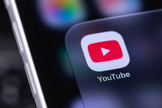 YouTube mobile logo on a screen smartphone iPhone closeup. YouTube is a free video sharing application that anyone can watch. Batumi, Georgia - October 3, 2026