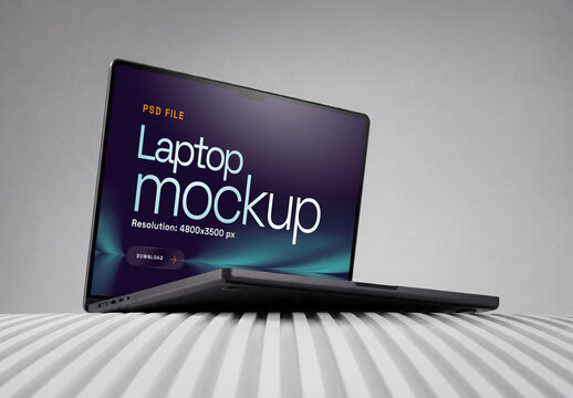 Laptop Mockup On Surface Angled Side Down View On Gray Background