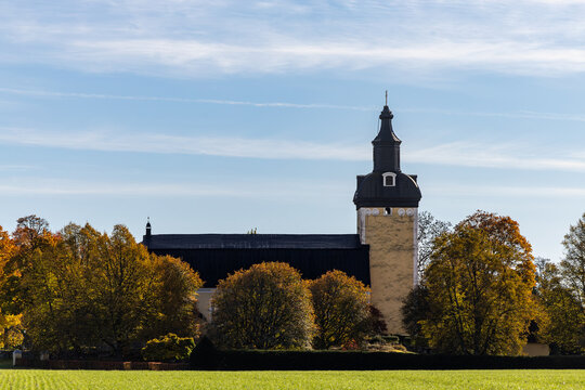 Nykoping, Sweden An autumn view of the Holo Kyrka, or Holo Church with foliage.