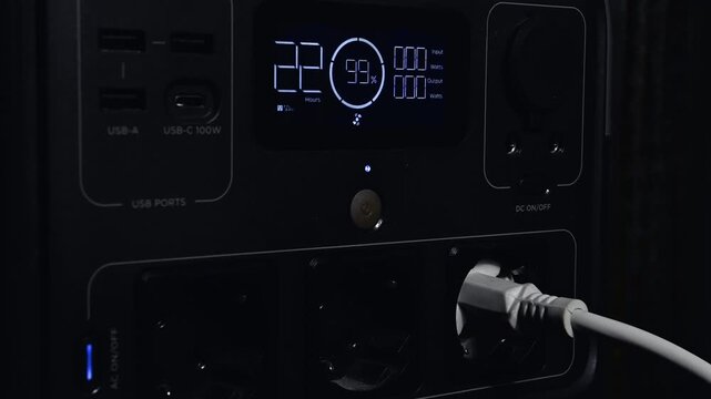 Portable Power Station Display Showing Charging Status During a Blackout