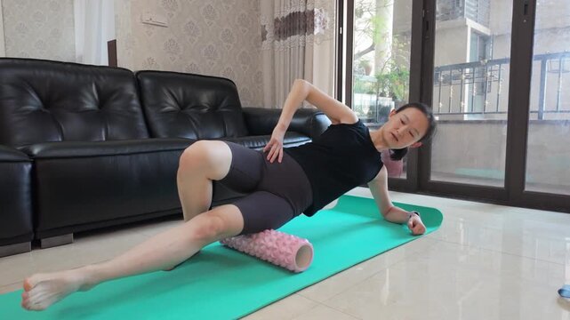 Woman Doing Side Plank Workout At Home Indoor Fitness Session