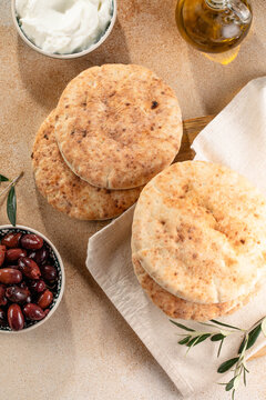 pita bread with olives and olive oil