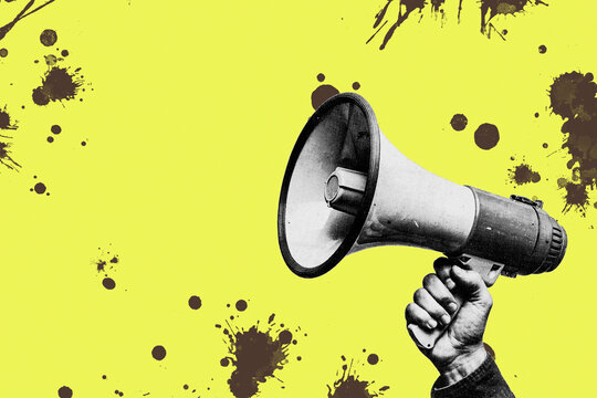 Hand holding megaphone on yellow background with ink splatters conceptual illustration