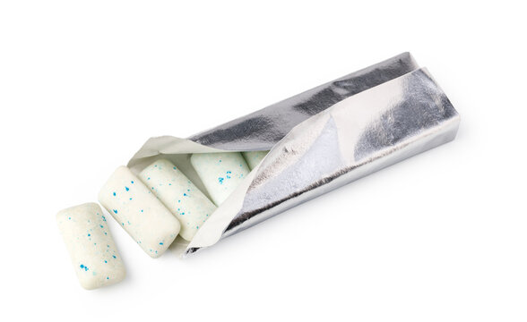 Peppermint chewing gum pieces in an opened silver foil wrapper