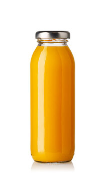 Glass bottle filled with orange juice on a white background
