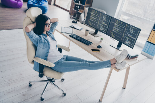 Full length photo of korean lady designer sit chair sleep after security server java script writing in workspace