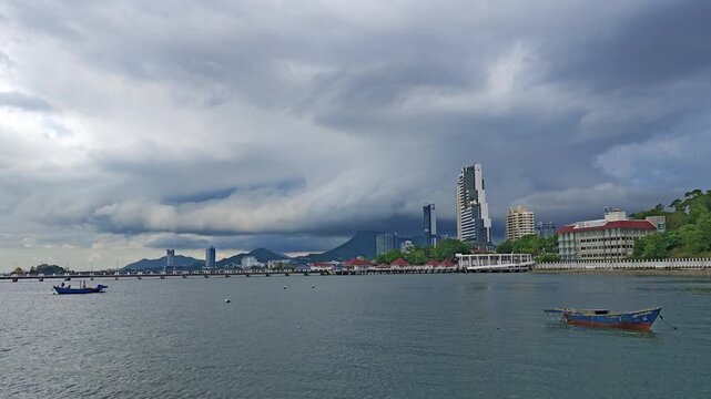 Storm Clouds over Si Racha Waterfront with Fishing Boats and City Skyline, Chon Buri Thailand