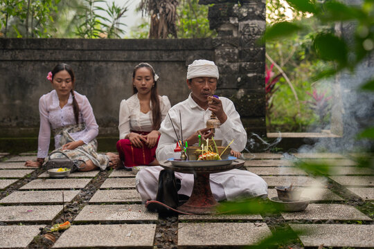 Traditional Ceremony Takes Place in Bali With Offerings and Worship