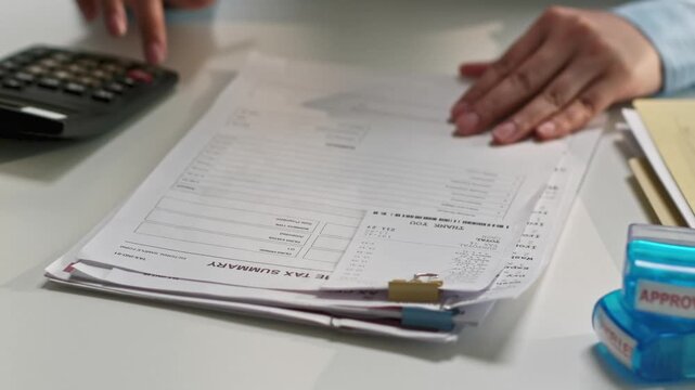 Business Office Desk with Financial Documents and Stationery for Accounting, Budgeting, and Planning Tasks