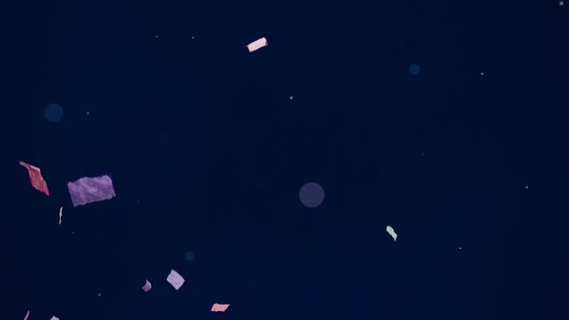 Appearing from left, confetti scattering across navy backdrop with bokeh for party, copy space