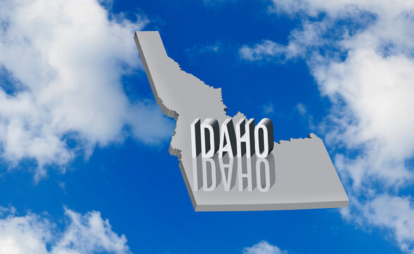 Three-dimensional Idaho map with raised lettering against a cloudy sky