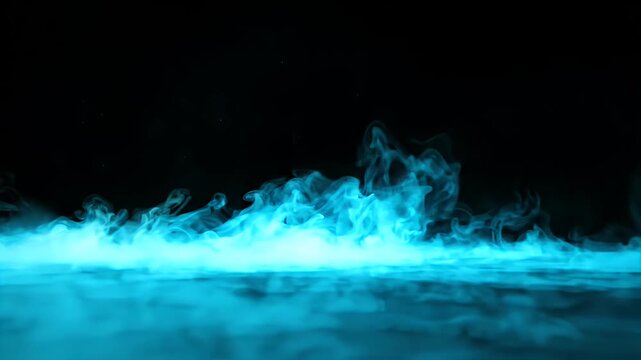Blue mist layer on ground against dark background.