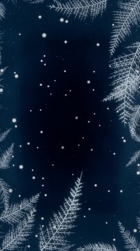 Vertical video: Playback starting, snow drifting and frost ferns forming on navy scene for winter