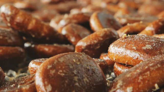 Glazed gingerbread cookies macro closeup. Sugar glaze honey biscuits production