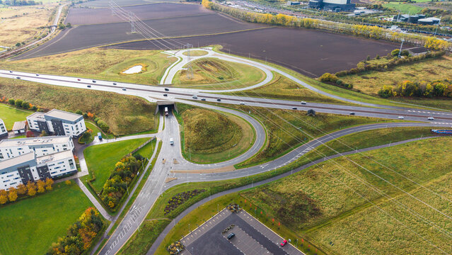Traffic moving through Queen Margaret University junction on A1 road near Musselburgh in East Lothian