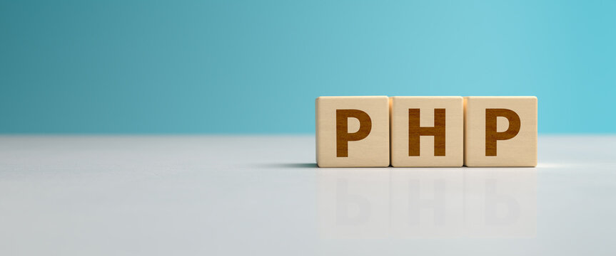 Wooden toy blocks forming the text PHP. PHP is a programming language used for web based applications. Hypertext Preprocessor