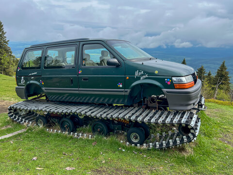 Swieradow-Zdroj, Poland, May 15, 2026: A snow-grooming vehicle (piste machine) waiting for the winter season