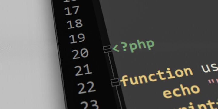Screenshot of a computer screen with an editor program with a PHP program open. The sequence "<?php" starts the source code.