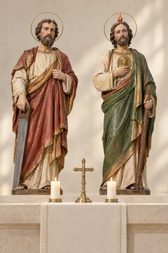Statues of the apostles Saint Simon with a saw and Saint Jude Thaddeus with a flame