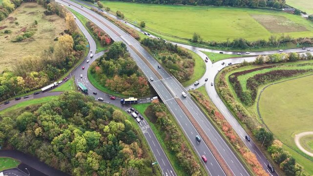 Top view of camera performing orbit tracking around roundabout at Old Craighall junction on A720 bypass and A1 road