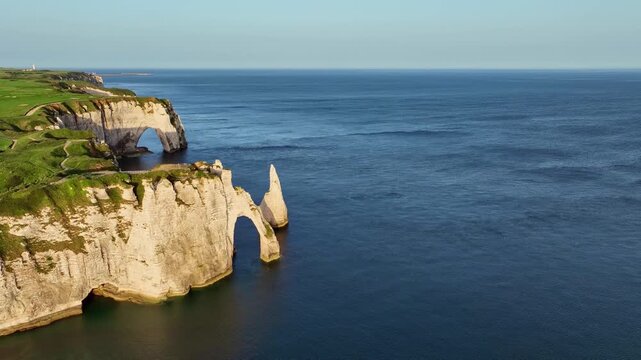 Aerial view of Porte d'Aval and La Manneporte rock formations, sights and natural beauty just after sunrise, &Eacute;tretat, Alabaster Coast, La C&ocirc;te d'Alb&acirc;tre, chalk cliffs, English Channel, Seine-Marit